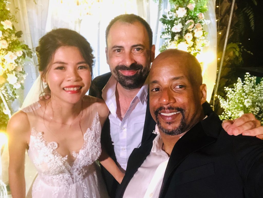 Wedding emcee JK Hobson with the newlyweds in An Khanh, Ho Chi Minh City