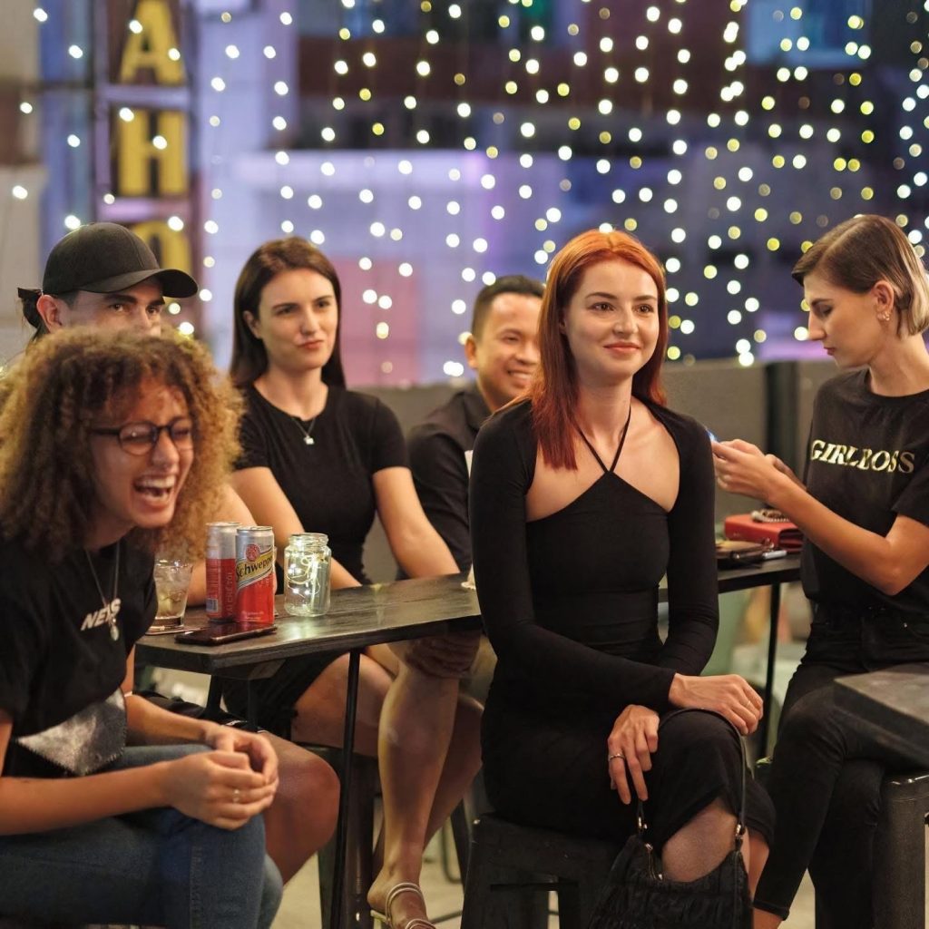 Trivia night crowd laughing at a music quiz at Saigon Rogue